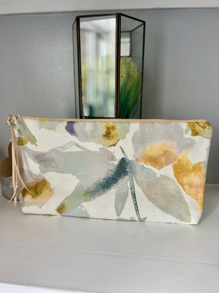 Handsewn abstract print zipped fabric bag